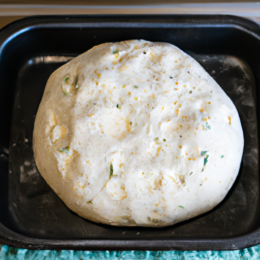 Homemade pizza dough ready to be rolled out and baked in a Dutch oven.